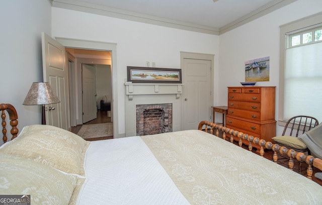 20 Salbide Ave, Newnan, GA 30263 - bedroom featuring a fireplace, wood finished floors, and ornamental molding