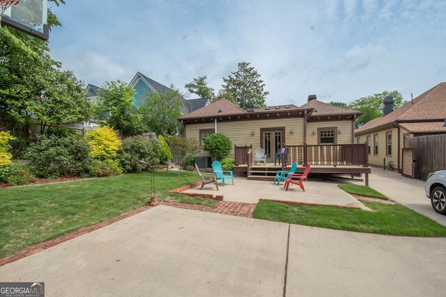 20 Salbide Ave, Newnan, GA 30263 - rear view of house featuring a patio, a deck, and a chimney