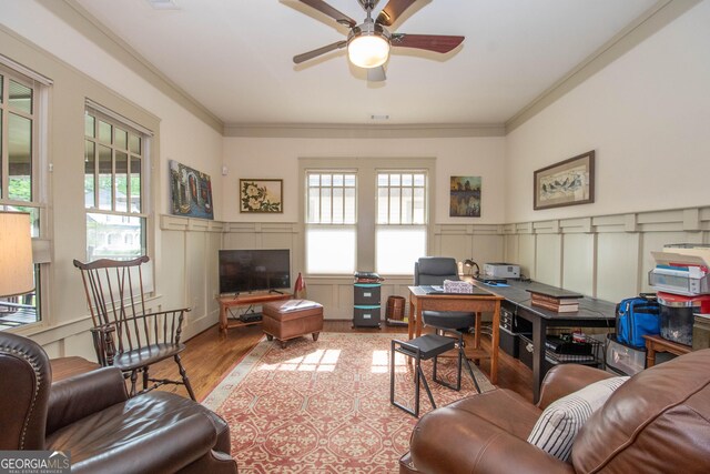 20 Salbide Ave, Newnan, GA 30263 - office area with a decorative wall, crown molding, a ceiling fan, wood finished floors, and wainscoting
