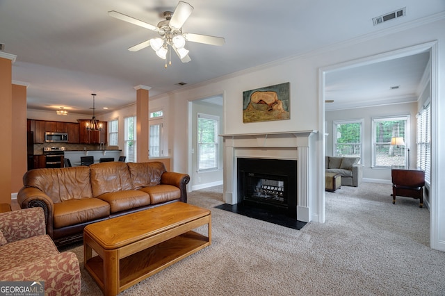 200 Hidden Spring Way, Athens, GA 30605 - living area with crown molding, carpet flooring, a fireplace with flush hearth, healthy amount of natural light, and a ceiling fan
