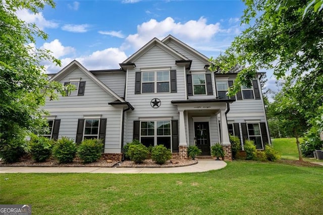 9225 Maple Run Trl, Gainesville, GA 30506 - craftsman-style home with a front yard and brick siding