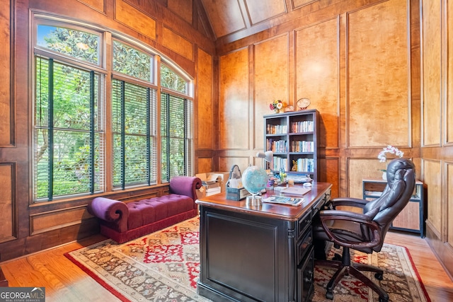 8340 Colonial Pl, Duluth, GA 30097 - office featuring a decorative wall, light wood finished floors, and lofted ceiling