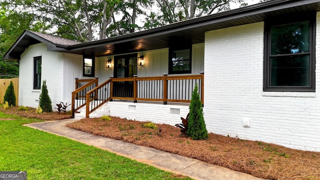 4296 Langdon Dr, Decatur, GA 30035 - view of front of house featuring brick siding, a porch, and a front yard