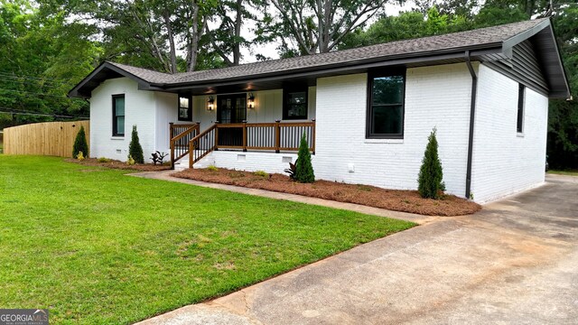 4296 Langdon Dr, Decatur, GA 30035 - single story home with brick siding, a porch, and a shingled roof