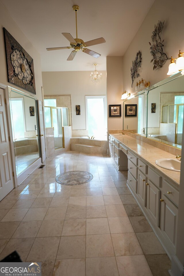 1010 Forest Overlook Dr SW, Atlanta, GA 30331 - bathroom featuring a ceiling fan, a bath, a chandelier, double vanity, and a shower stall