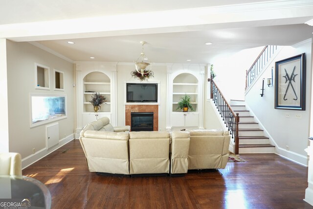 1010 Forest Overlook Dr SW, Atlanta, GA 30331 - living room with baseboards, stairs, a glass covered fireplace, dark wood-style floors, and recessed lighting