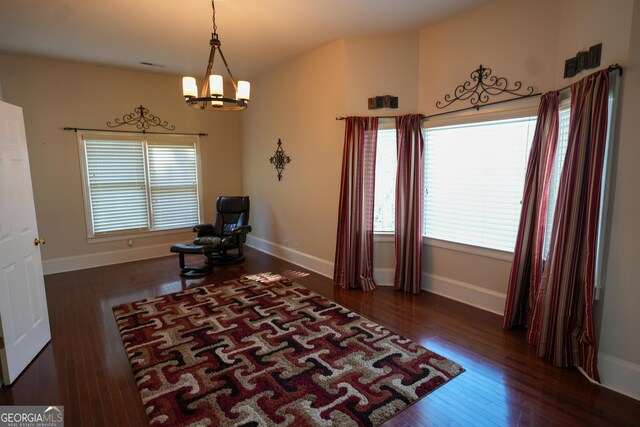 1010 Forest Overlook Dr SW, Atlanta, GA 30331 - living area featuring a chandelier, baseboards, and wood finished floors