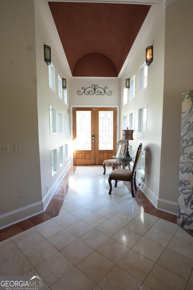 1010 Forest Overlook Dr SW, Atlanta, GA 30331 - entrance foyer featuring french doors, baseboards, and high vaulted ceiling