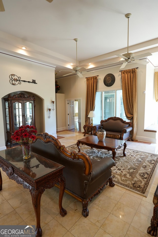 1010 Forest Overlook Dr SW, Atlanta, GA 30331 - living area featuring ceiling fan, baseboards, and arched walkways