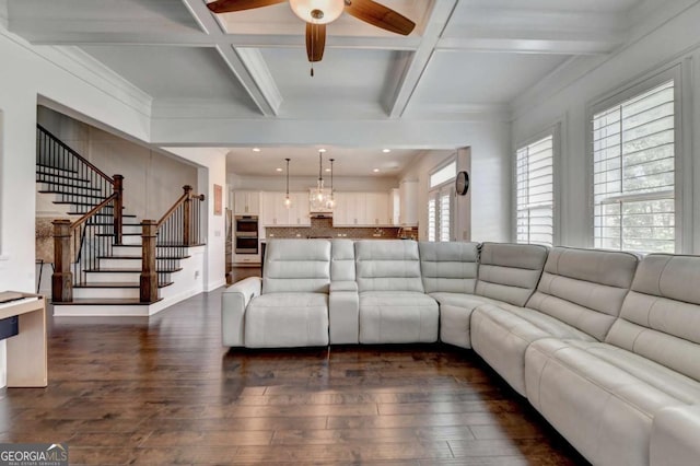 828 Olmsted Ln, Duluth, GA 30097 - living area with dark wood-style floors, ceiling fan, stairs, coffered ceiling, and beamed ceiling