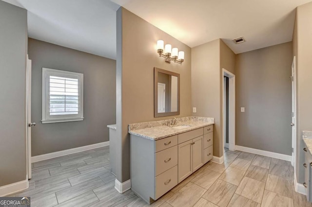 828 Olmsted Ln, Duluth, GA 30097 - full bath featuring vanity and baseboards