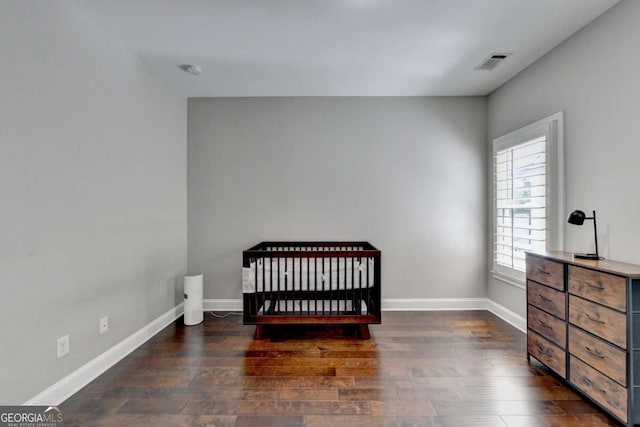 828 Olmsted Ln, Duluth, GA 30097 - bedroom with wood finished floors and baseboards