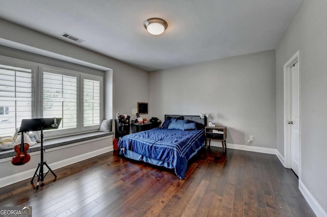 828 Olmsted Ln, Duluth, GA 30097 - bedroom with dark wood-type flooring and baseboards