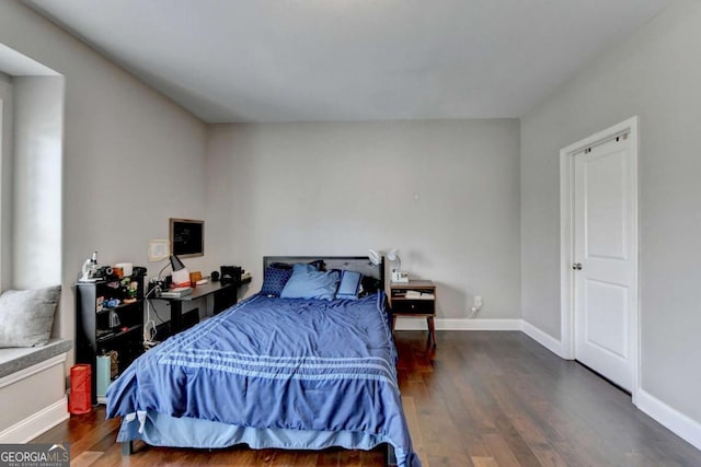 828 Olmsted Ln, Duluth, GA 30097 - bedroom with wood finished floors and baseboards