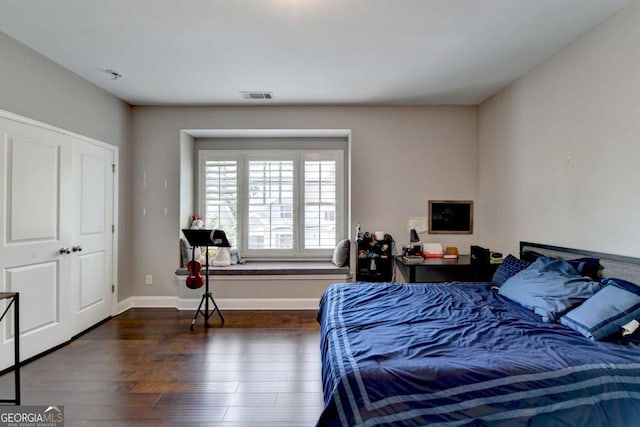 828 Olmsted Ln, Duluth, GA 30097 - bedroom featuring dark wood finished floors and baseboards