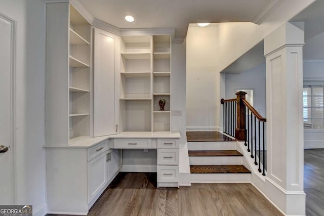 828 Olmsted Ln, Duluth, GA 30097 - unfurnished office with built in study area, dark wood-style flooring, baseboards, ornate columns, and recessed lighting