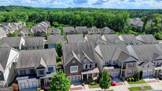 828 Olmsted Ln, Duluth, GA 30097 - aerial view of residential area featuring a heavily wooded area