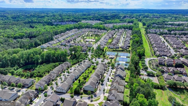 828 Olmsted Ln, Duluth, GA 30097 - aerial view of property's location with nearby suburban area and a forest
