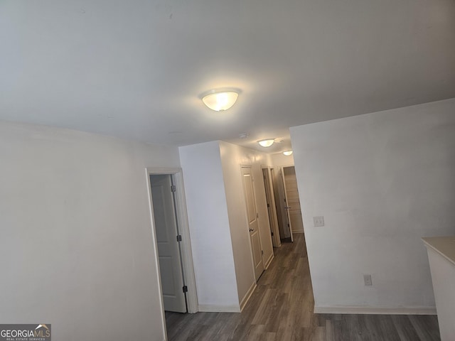 7253 Lacey Dr, Douglasville, GA 30134 - spare room featuring wood finished floors and baseboards
