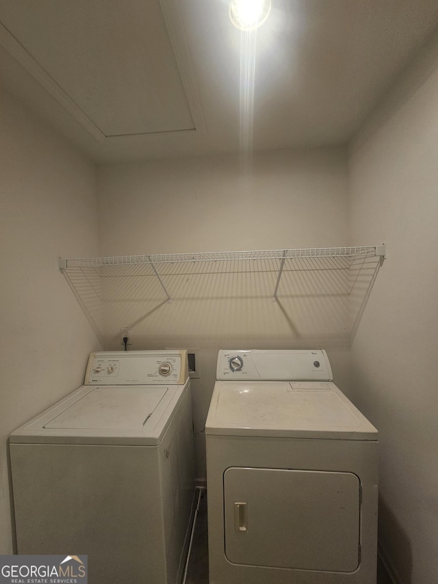 7253 Lacey Dr, Douglasville, GA 30134 - laundry area featuring independent washer and dryer