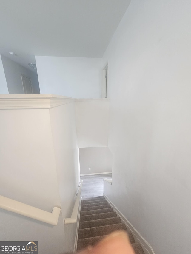 7253 Lacey Dr, Douglasville, GA 30134 - staircase featuring baseboards