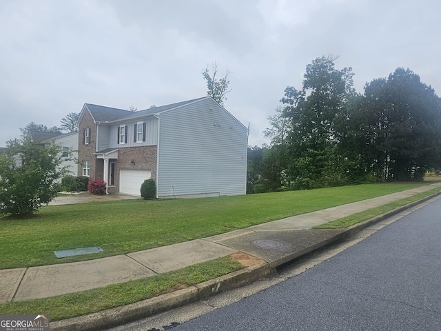 7253 Lacey Dr, Douglasville, GA 30134 - view of side of property with brick siding, a garage, a lawn, and driveway