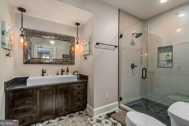 430 Milledge Cir, Athens, GA 30609 - bathroom featuring toilet, baseboards, a shower stall, and vanity