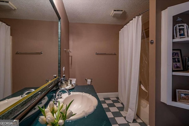 430 Milledge Cir, Athens, GA 30609 - full bathroom featuring tile patterned floors, a textured ceiling, a shower with curtain, and vanity