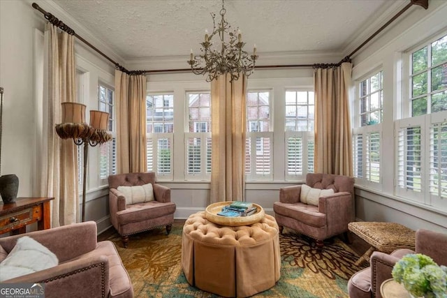 430 Milledge Cir, Athens, GA 30609 - sunroom / solarium with french doors, healthy amount of natural light, a chandelier, a textured ceiling, and ornamental molding