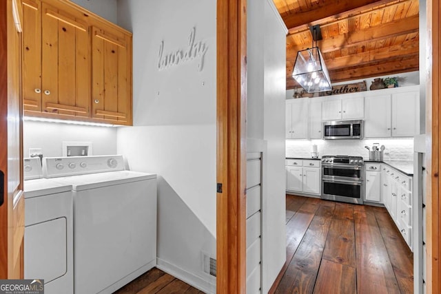 223 Denny Ridge Rd, Jasper, GA 30143 - clothes washing area featuring independent washer and dryer, wooden ceiling, dark wood-style floors, and cabinet space