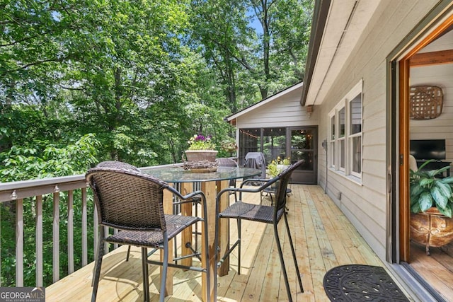 223 Denny Ridge Rd, Jasper, GA 30143 - wooden deck featuring outdoor dining area and a sunroom