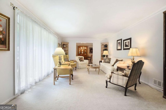 carpeted living room featuring a chandelier and crown molding