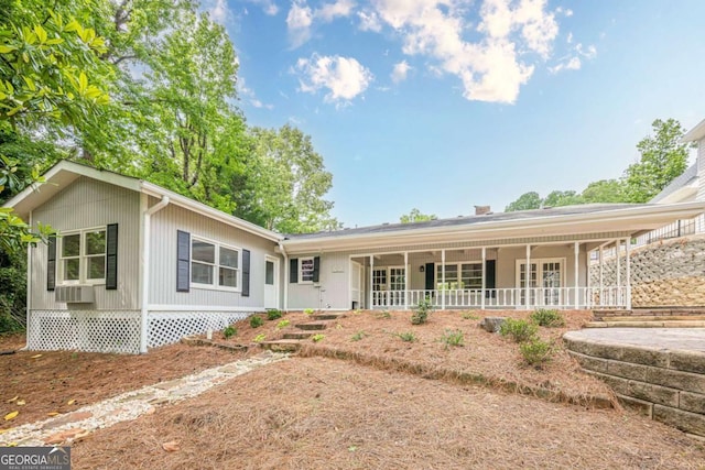 2555 Chattahoochee Ln, Cumming, GA 30041 - view of front of home with covered porch and cooling unit