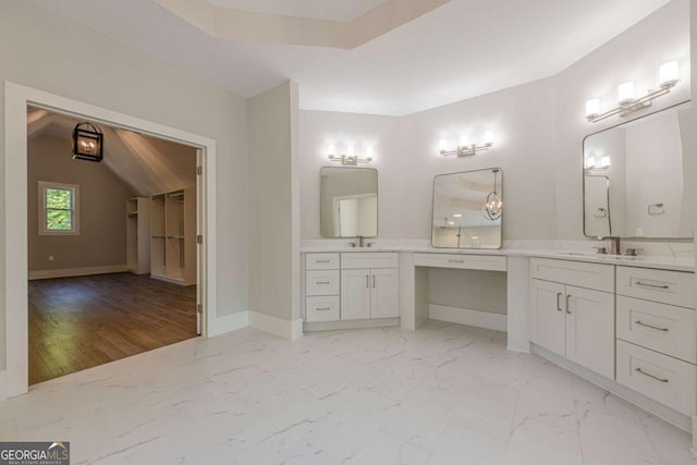 2555 Chattahoochee Ln, Cumming, GA 30041 - full bath featuring vanity, marble finish flooring, and a spacious closet