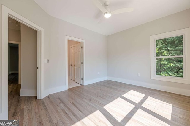 2555 Chattahoochee Ln, Cumming, GA 30041 - unfurnished room with wood finished floors and ceiling fan