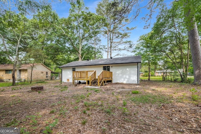 6932 Eunice Dr, Riverdale, GA 30274 - rear view of property with a wooden deck
