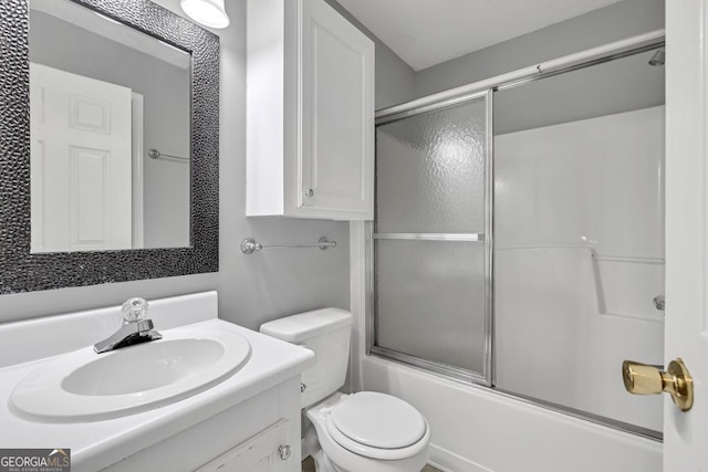 2866 Florence Dr, Gainesville, GA 30504 - full bath featuring vanity, bath / shower combo with glass door, and toilet