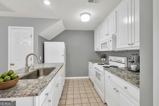 2866 Florence Dr, Gainesville, GA 30504 - kitchen featuring white appliances, a sink, baseboards, white cabinets, and light tile patterned floors