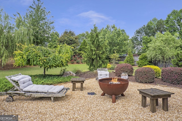 3179 Falls Crest Ct, Buford, GA 30519 - view of yard with a fire pit