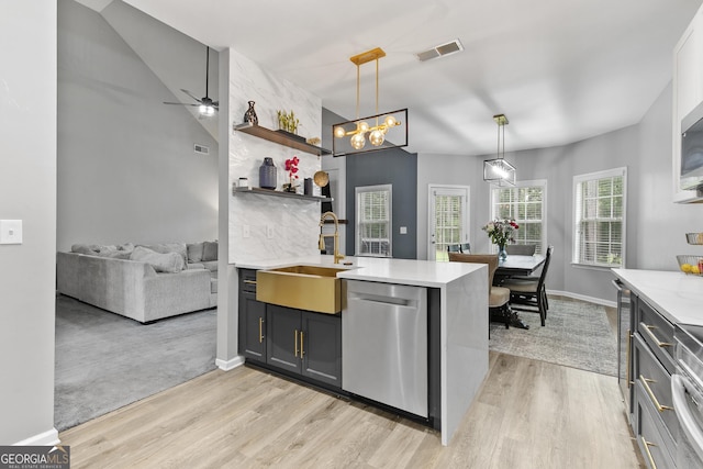 3 Tiffany Trce, Palmetto, GA 30268 - kitchen featuring dishwasher, light wood-style flooring, open shelves, and pendant lighting