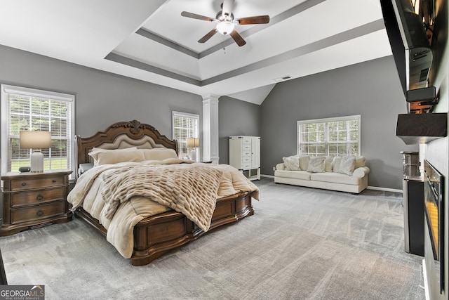 3 Tiffany Trce, Palmetto, GA 30268 - carpeted bedroom with decorative columns, multiple windows, a ceiling fan, and a raised ceiling