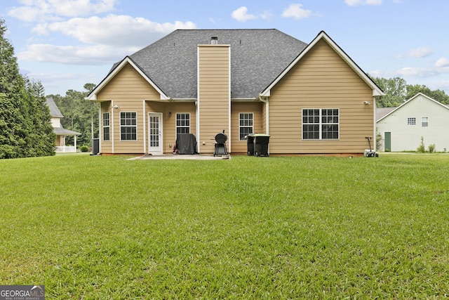 3 Tiffany Trce, Palmetto, GA 30268 - back of property with roof with shingles, a yard, and a patio