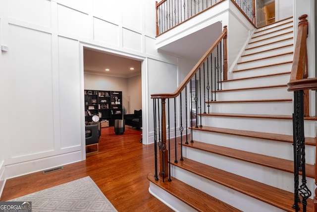 1000 Admiral Xing, Alpharetta, GA 30005 - stairs featuring a decorative wall and wood finished floors