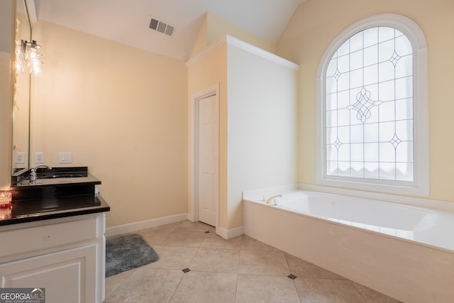 1000 Admiral Xing, Alpharetta, GA 30005 - bathroom with vanity, a bath, vaulted ceiling, tile patterned flooring, and baseboards
