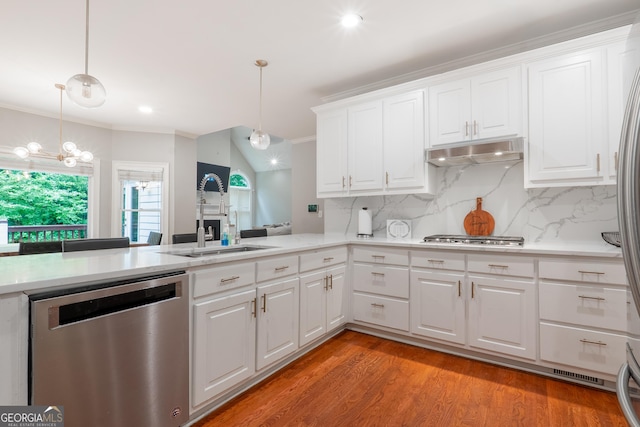 1000 Admiral Xing, Alpharetta, GA 30005 - kitchen with stainless steel appliances, under cabinet range hood, a sink, light countertops, and decorative backsplash