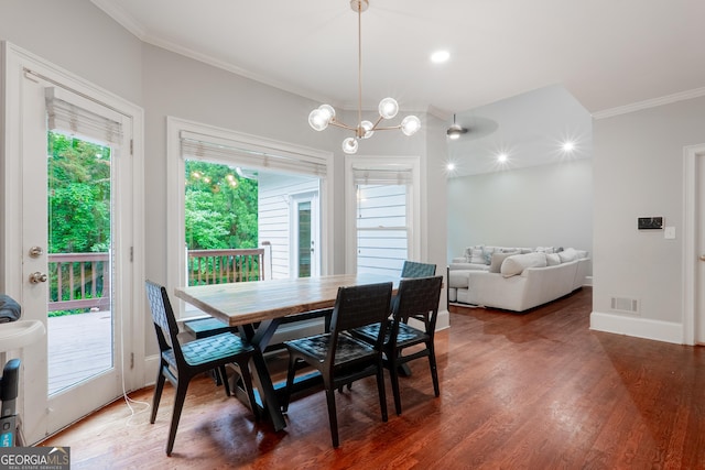 1000 Admiral Xing, Alpharetta, GA 30005 - dining room with crown molding, wood finished floors, a chandelier, and baseboards