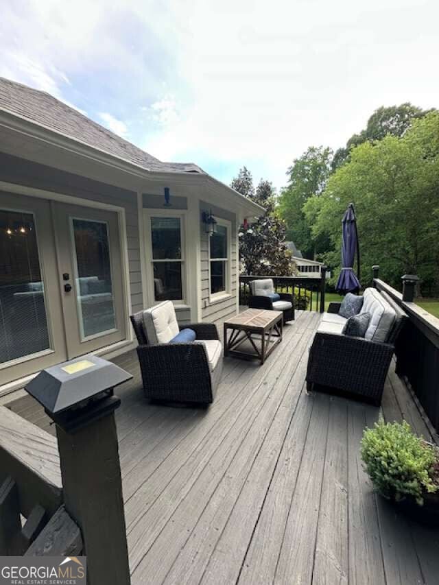 1305 Lake Forest Ln, Mcdonough, GA 30253 - deck featuring outdoor lounge area
