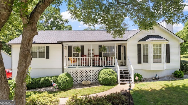 2675 Springside Ct, Douglasville, GA 30135 - ranch-style house featuring covered porch, a front yard, stairs, and a shingled roof