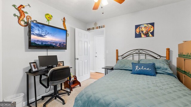 2675 Springside Ct, Douglasville, GA 30135 - bedroom featuring carpet floors, an office area, and a ceiling fan