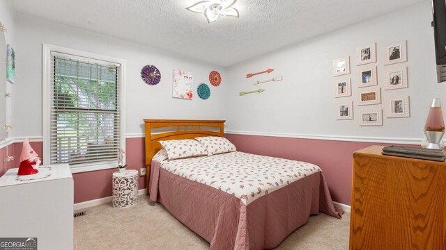 2675 Springside Ct, Douglasville, GA 30135 - bedroom with carpet flooring, a textured ceiling, and baseboards